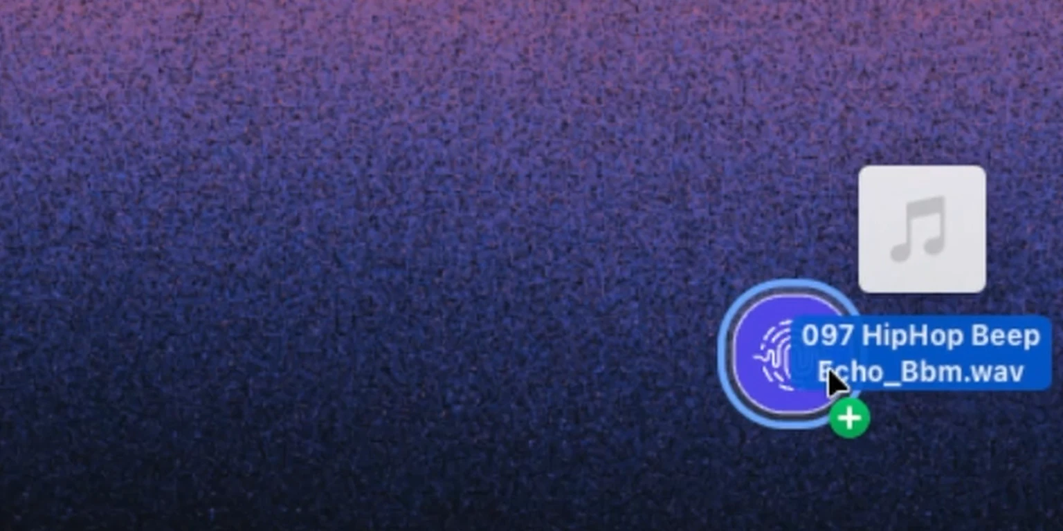 A sound file being dragged onto the purple Vibseek orb on the desktop